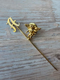 Pair of Gold Tone Pins: “A” Stick Pin & Cherub