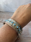 Silver Tone Hinged Cuff Bracelet with Blue Stones