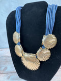 Gold Tone Seashell Cluster Multi-Strand Blue Corded Statement Necklace