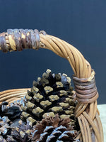 Woven Basket Full of Pinecones