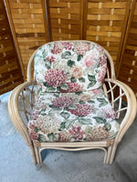 Wicker Chair and Ottoman with Floral Cushions