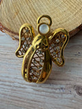 Pair of Gold Tone Holiday Brooches (A)