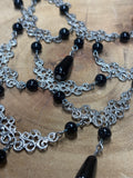 Cascading Silver Tone Necklace with Black Beads