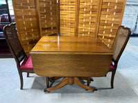 Drop Leaf Table with (2) Leaves, and (4) Can Back Chairs