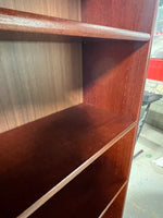 A- Particle Board Bookcase