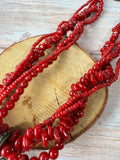 Red Beaded Torsade Necklace with Bronze Tone Filigree Pendant