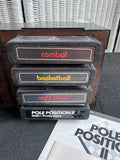 Lot of 8 Assorted Atari 2600 & 7800 Games with Manuals in 8-Cartridge Musicmate Modular Storage Rack (B)