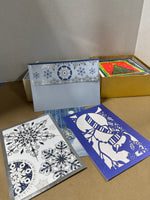 Assorted Variety Of Holiday Cards And Envelopes