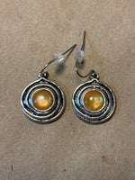 Round Silver Tone Earrings with Yellow Bead