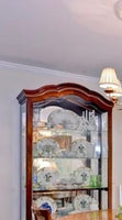 Howard Miller Mirrored Back Curio Cabinet