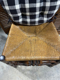 Round Table with (2) Leaves and (4) Ladder Back Chairs, with Plaid Seat Cushions.