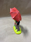 European Folk Art Couple Under Umbrella Figurine