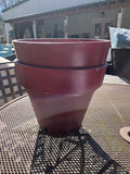 A-Pair of Red Plastic Planters