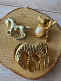 Trio of Gold Tone Vintage Animal Brooches