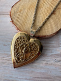 Long Vintage Gold Tone Heart Locket Necklace with Filigree Accents