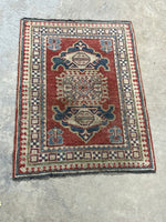 E-Hand Knotted Woollen Carpet, Coral/blue tones, 36"x27". Made in Pakistan.