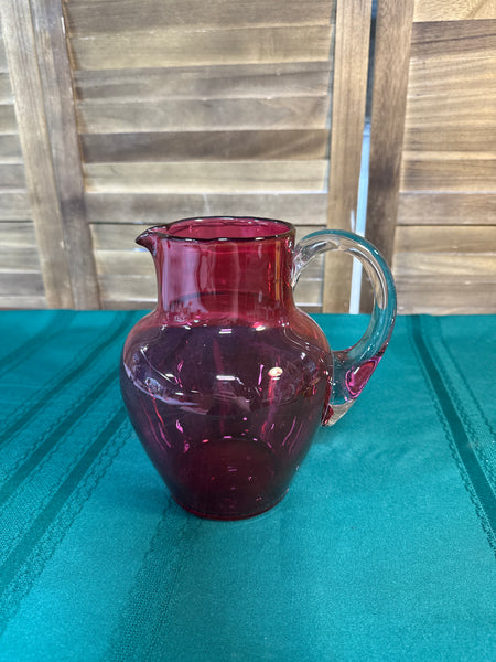 (A) Cranberry Glass Pitcher