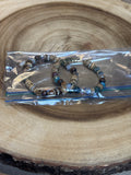 Pair of Bracelets with Feather Details