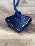 Multi Colored Glass Pendant on Blue Suede Cord