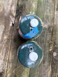 Two Coleman Propane Cannisters