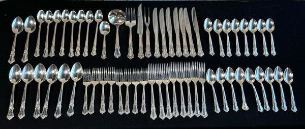 63-Piece WM. A. Rogers Oneida Sectional Silver Plate Valley Rose Flatware Set