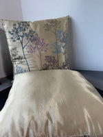 Pair of Champagne Throw Pillows with Multicolored Dandelions