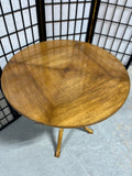 Round Wooden Occasional Table with Mid Century Flair