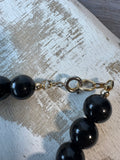 Black & Gold Tone Beaded Vintage Necklace with Boomerang Pendant