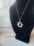Silver Tone Textured Flower Pendant Necklace with Black Stone