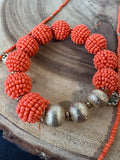 Long Gold Tone Disc & Orange Beaded Necklace & Stretch Bracelet Set
