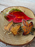Trio of Enamel Autumn Leaf Brooches