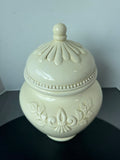 Large Cream Colored Embossed Ceramic Urn