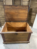 Antique Wooden Trunk with Metal Accents on Casters