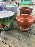 (G)Lot of Five Planters and Six 6” Plastic Saucers