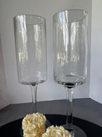 Pair of Pier 1 Glass Pedestal Hurricanes with Rose Carved Pillar Candles