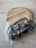 Trio of Silver Tone & Stretch Bracelets