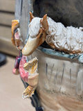 Vase with 3-D Farmer Feeding Straw to Horse in Stable