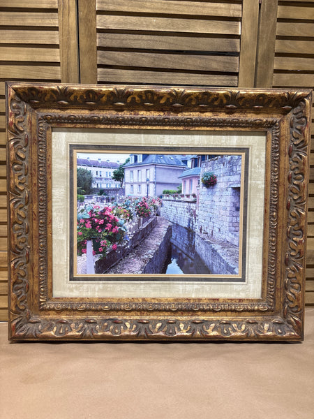 Picturesque Photo of Canal Running Through Town
