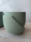 Pair of World Market Matte Sage Green Sculptural Ceramic Planters