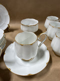 13 - Piece White And Gold Koran China Teacups Saucers And Sugar Dish