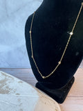 Textured Gold Tone Station Necklace with Cube Accents