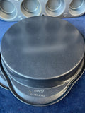 Two Wilton 9” Round Nonstick Cake Pans and 12 Cup Muffin Pan (Unbranded)