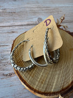 (D) Pair of Silver Tone Earrings