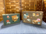Pair of Decorative Travel Themed Suitcases
