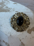 Ornate Gold Tone Filigree Brooch with Black Lucite Cabochon