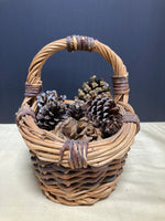 Woven Basket Full of Pinecones