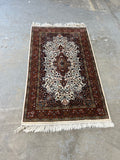 Hand Woven Rug (cream/rust/brown) 5'6" fringe to fringe x 3'