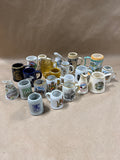 (A) 22 Piece Mini Stein Souvenir Glasses