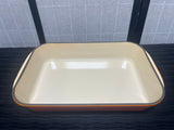 Le Creuset Orange Cast Iron Enameled Rectangular Roasting Dish with Metal Wire Handles