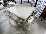 Cream Colored Folding Card Table with (4) Folding Chairs